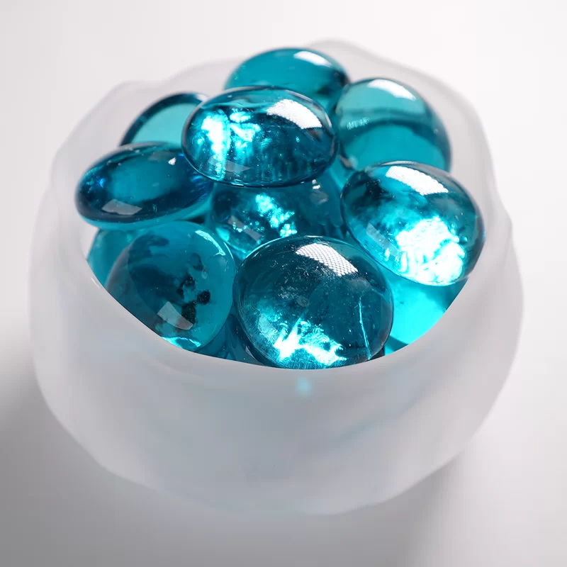 Batu kacang gudang kaca, manik rata kaca yang digunakan untuk hiasan